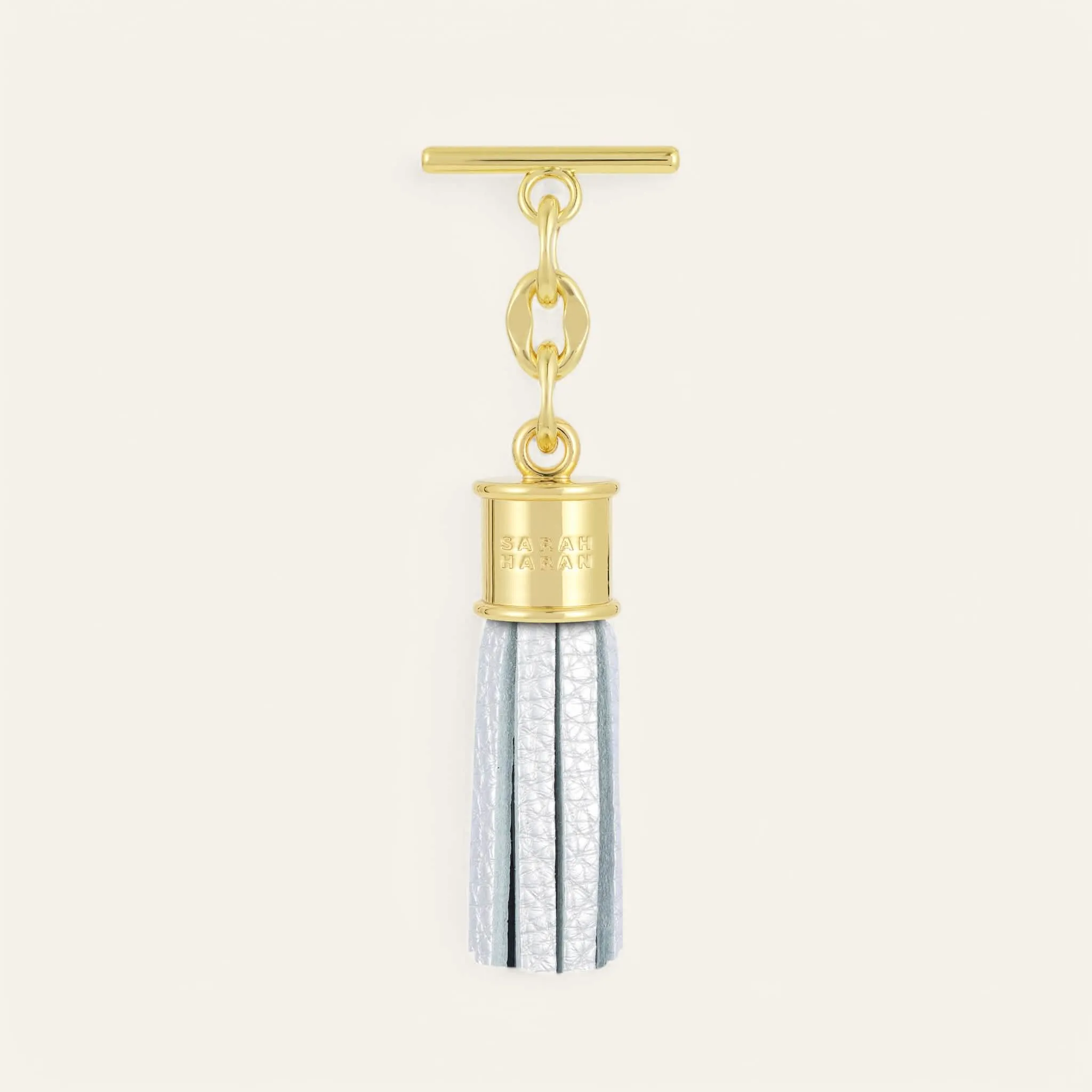 Capsule Tassel Mini | Soft Metallic Silver with Gold hardware