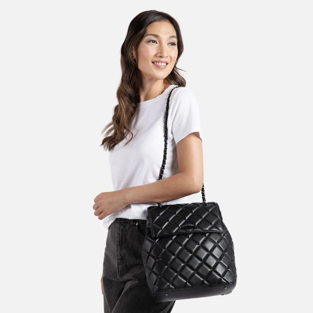 Le Sadie - Sac à dos 2-en-1 matelassé en cuir vegan noir