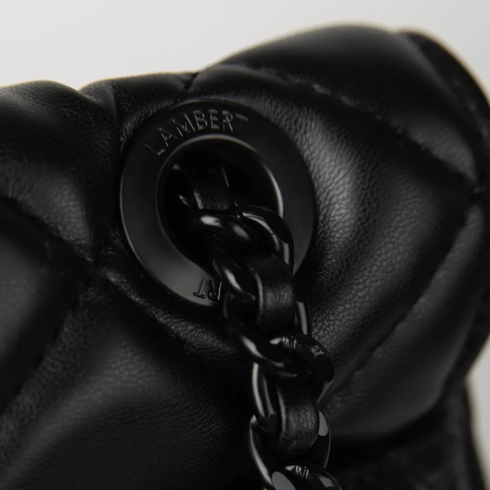 Le Sadie - Sac à dos 2-en-1 matelassé en cuir vegan noir