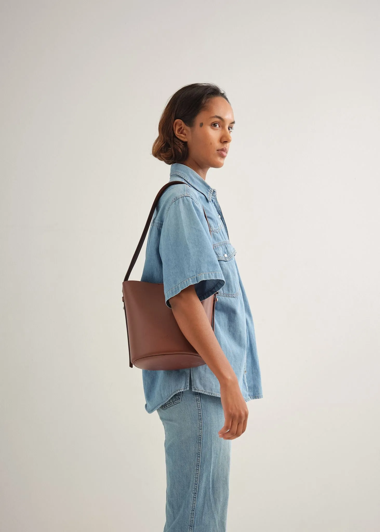 LITTLE LEO BUCKET BAG - RUSTY VITELLO
